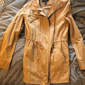 Tan trench coat